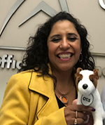 OTiS Winner, Martha Neely holding plush OTiS dog