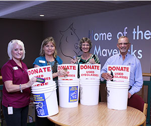 Lions Club donation for eyeglasses and cellphone bins
