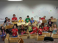Youth camp woodworking group of students