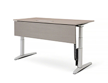 photo of an employee single-sided desk with a modesty panel in the cly noce laminate finish