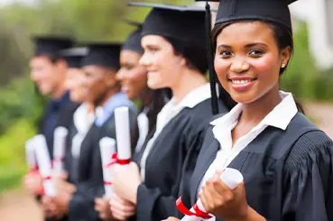 students in grad caps and gowns