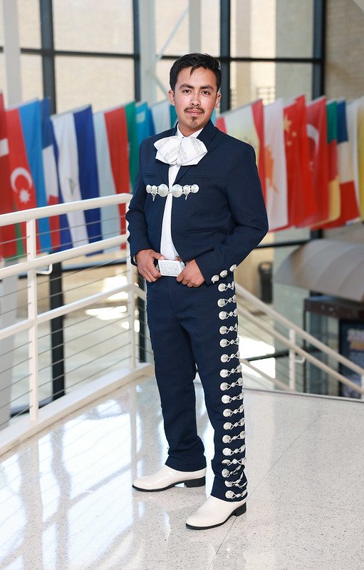 Jose Aguilar posing in the LSC-North Harris Library lobby.
