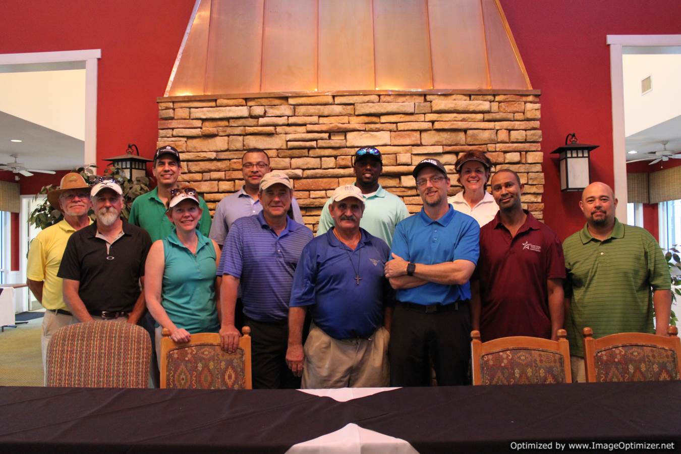 Group picture of LSC employees and students at a golf tournament