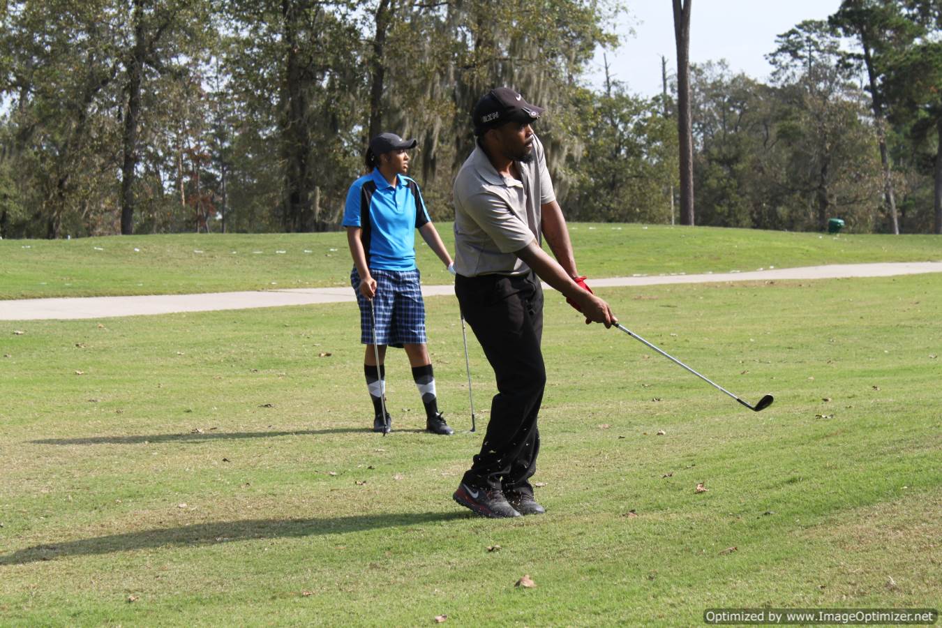 Photo of students playing golf