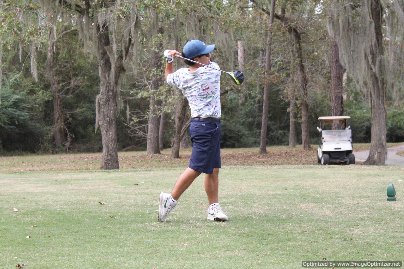Photo of student playing golf