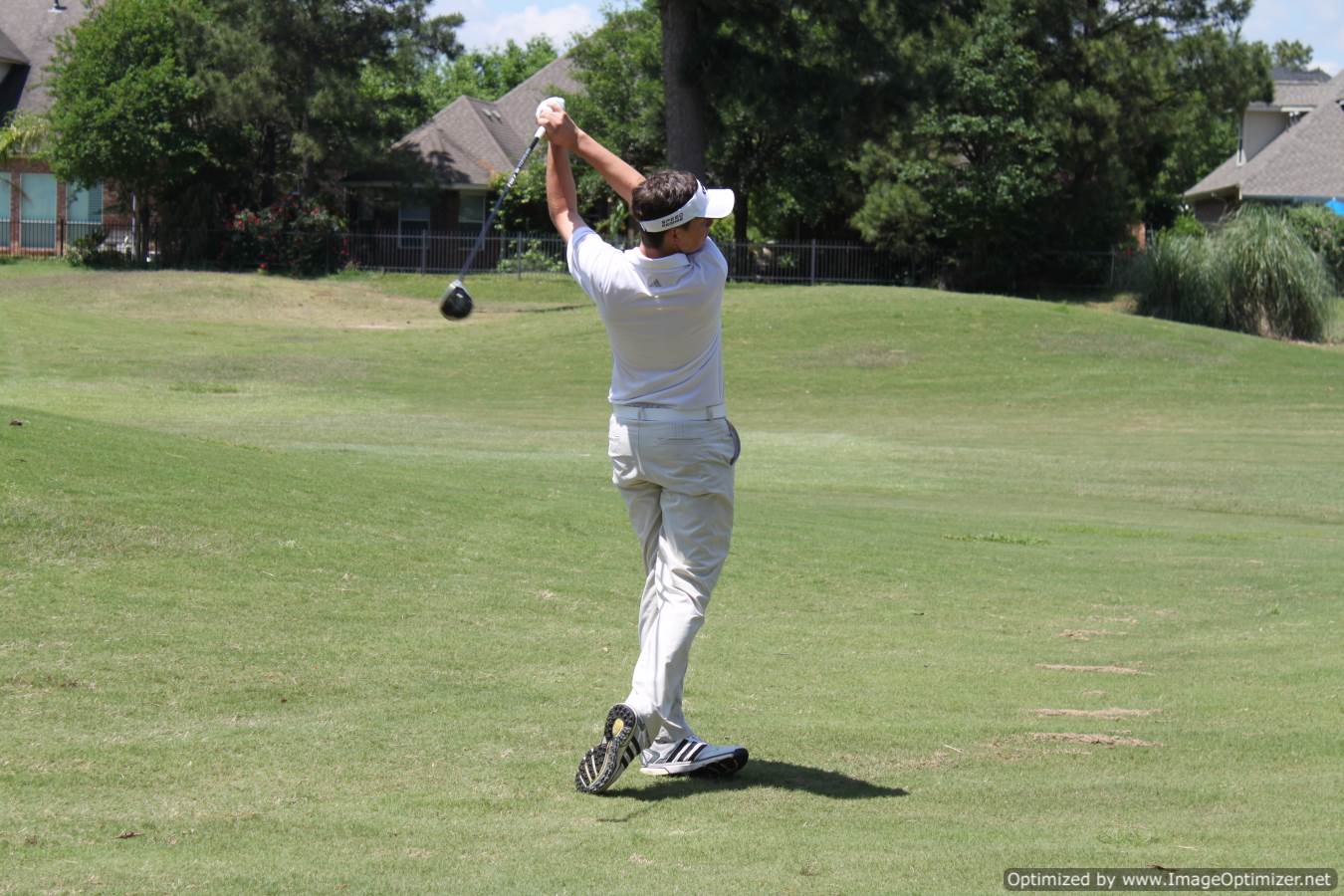 Photo of student playing golf