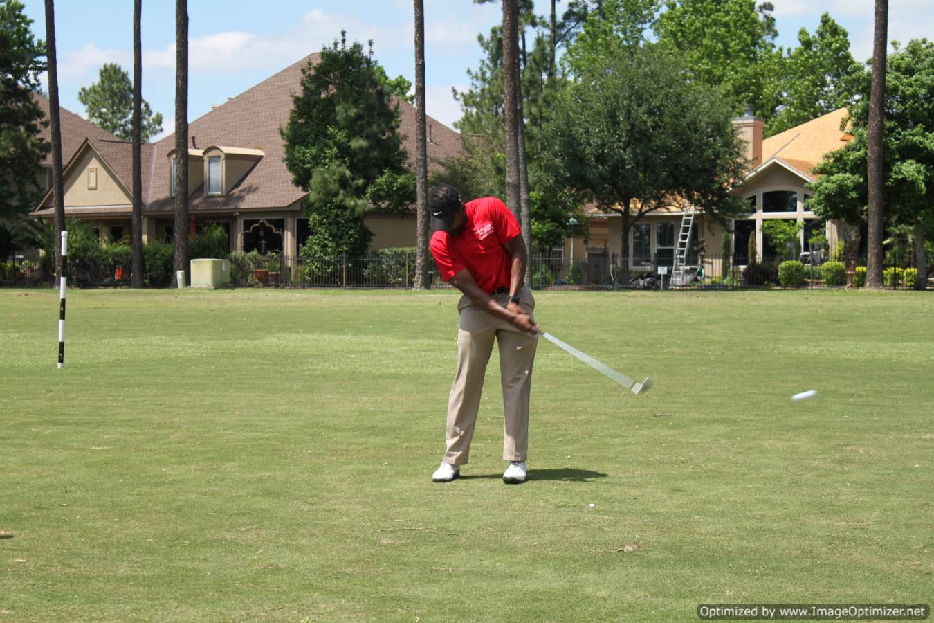 Photo of LSC employee playing golf