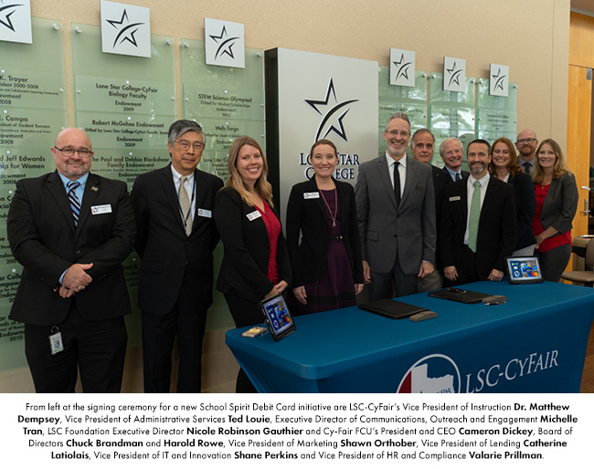 From left at the signing ceremony for a new School Spirit Debit Card initiative are LSC-CyFairs Vice President of Instruction Dr. Matthew Dempsey, Vice President of Administrative Services Ted Louie, Executive Director of Communications, Outreach and Engagement Michelle Tran, LSC Foundation Executive Director Nicole Robinson Gauthier and Cy-Fair FCUs President and CEO Cameron Dickey, Board of Directors Chuck Brandman and Harold Rowe, Vice President of Marketing Shawn Orthober, Vice President of Lending Catherine Latiolais, Vice President of IT and Innovation Shane Perkins and Vice President of HR and Compliance Valarie Prillman.