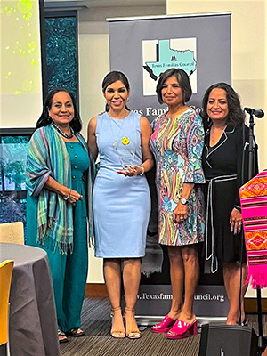 LSC-Kingwood President Dr. Melissa Gonzalez, second from left, accepted the Izcalia Award, from the Texas Familias Council (from left) Alejandra Tapia, educator and executive council member; Becky Gustamante, council member and retired dean of Business and Social Sciences from LSC-Montgomery; and Maria Baños Jordan, council founder.