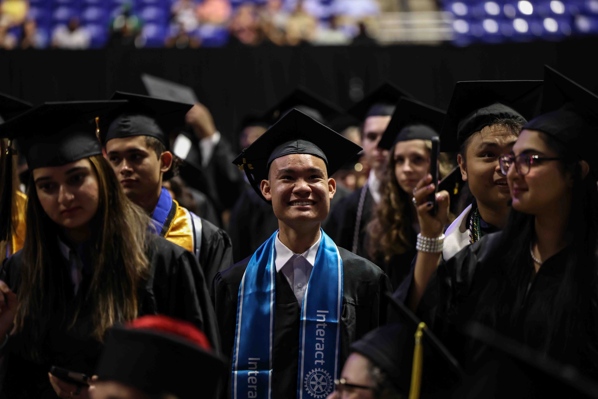 May 2022 Commencement Photo of Graduates with Leo the Mascot