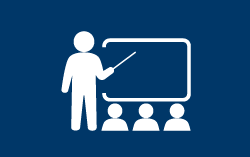 icon of teacher pointing to screen in front of students for FQE pedagogically excellent