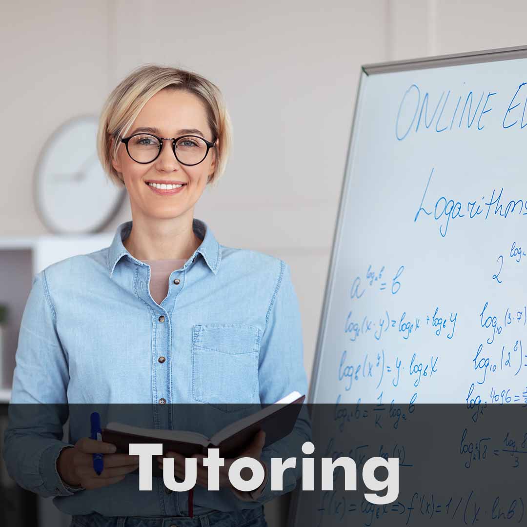 The word Tutoring is written across the bottom of the image as a header. One woman standing next to a white board with mathematical equations written on it.