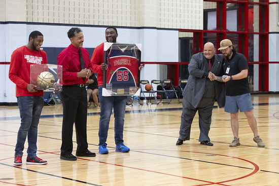 Photo of Coach Jamar Finnie being honored at LSC-Kingwood vs. Tomball basketball game