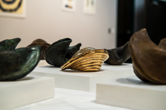 Photo of fortune cookie bronze sculptures created by LSC-Kingwood art professor Mari Omari