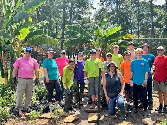 Photo of Boy Scout Troop helping in LSC-Kingwood Learning Garden