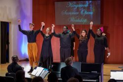 Photo of students singing in Opera performance