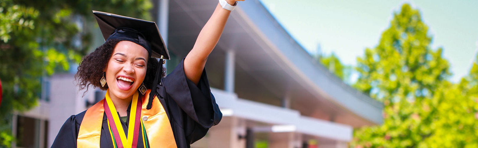 woman celebrating graduating from college